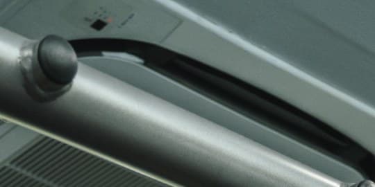 Close-up of a pulldown station frame and cable in the Progressive Performance studio.