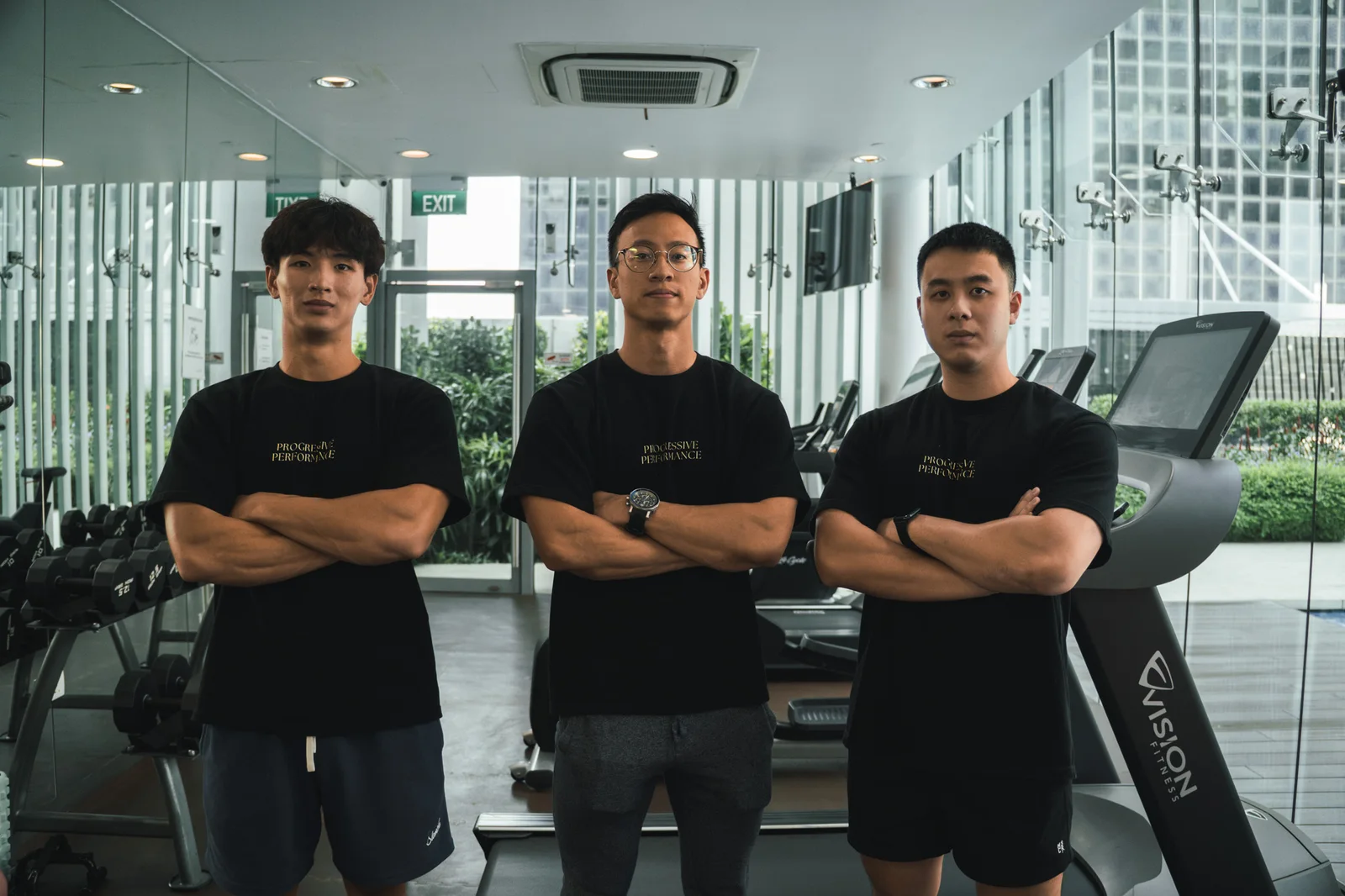 Progressive Performance coaching team in a Singapore training studio